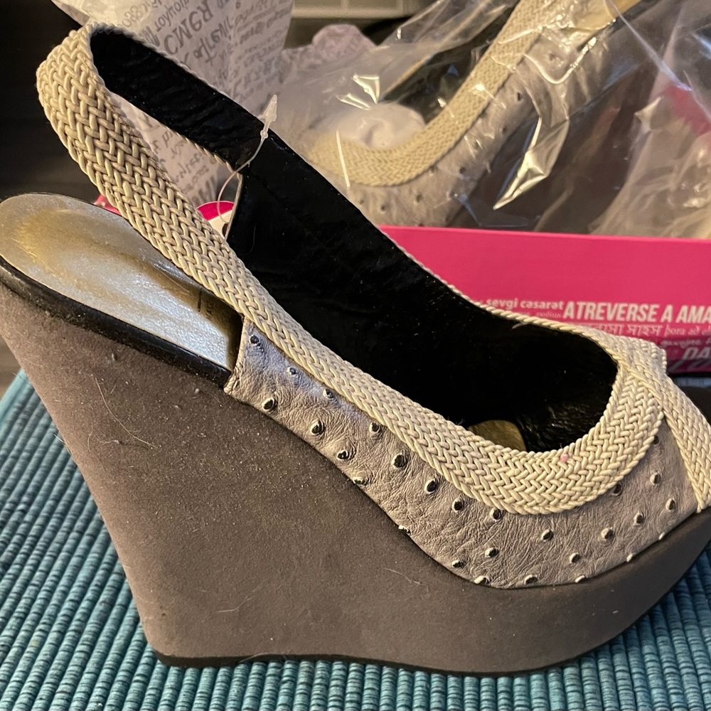 Grey wedge sandals.  Never worn still in box size 11.